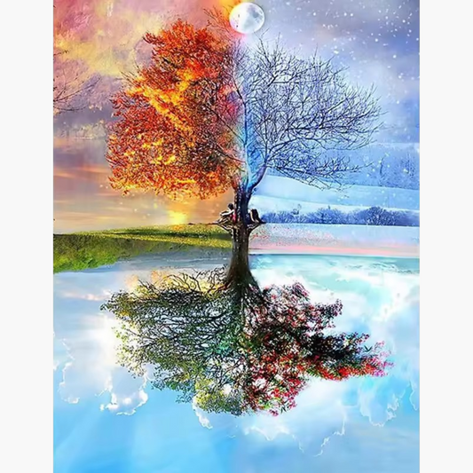 a tree that transitions from the warm colors of autumn to the icy chill of winter, perfectly reflected in a serene lake